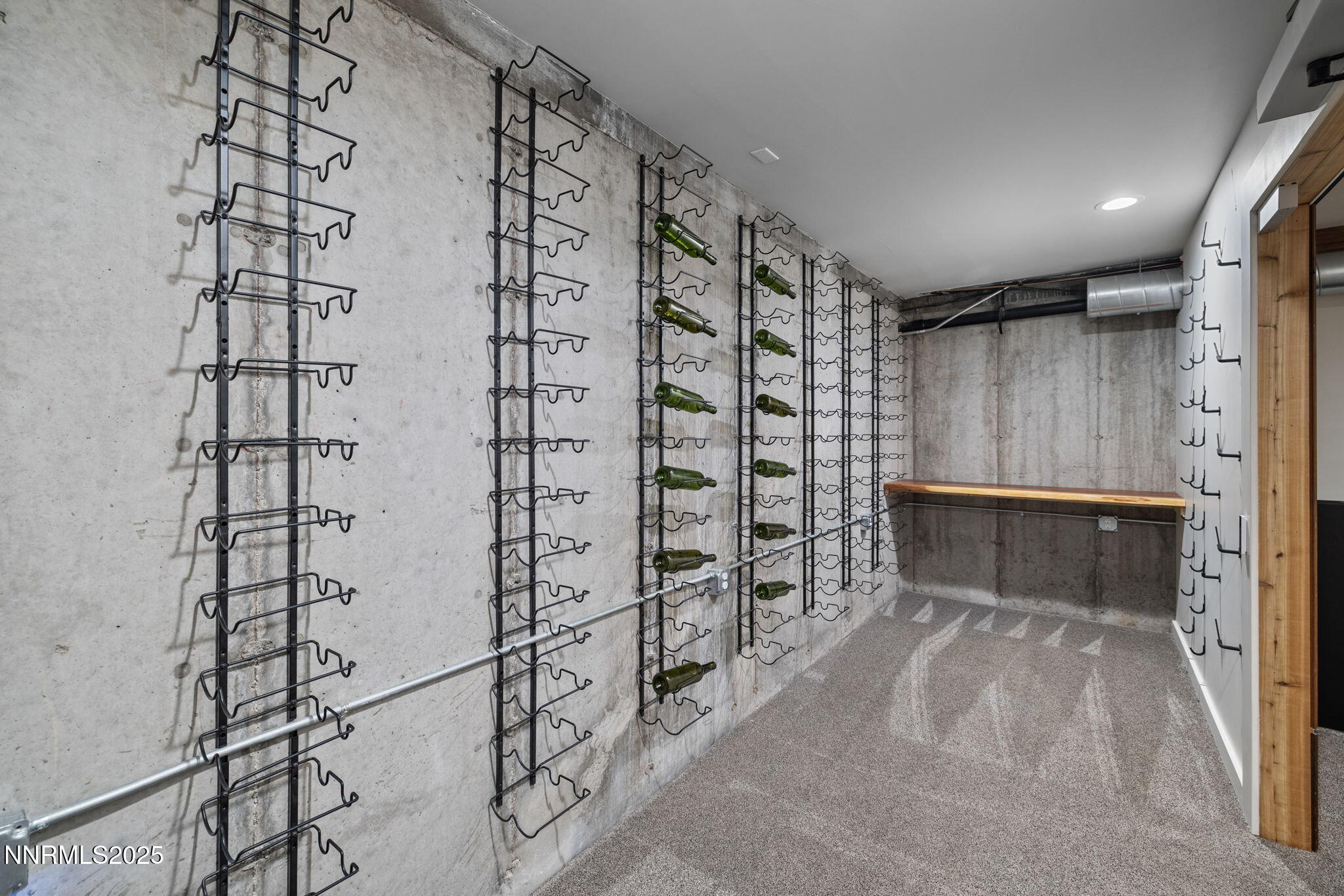 2255 Warrior Lane Reno, NV 89523 - Photo 37 of 52 a view of walk in closet with clothes and shoes