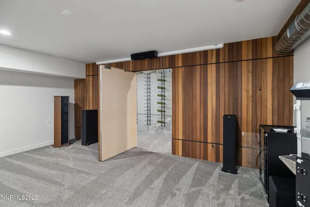 a kitchen with granite countertop a sink and cabinets