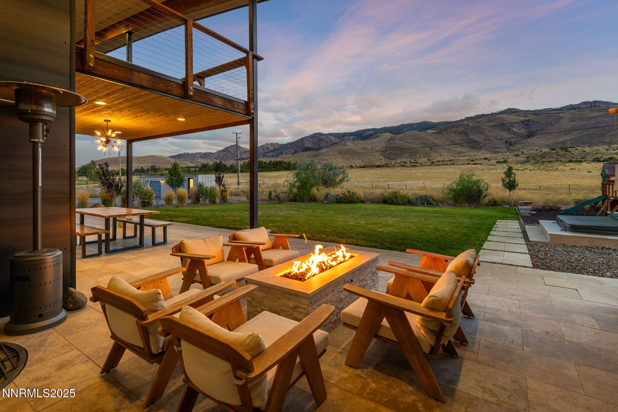 2255 Warrior Lane Reno, NV 89523 - Photo 43 of 52 a view of an outdoor sitting area with furniture and garden