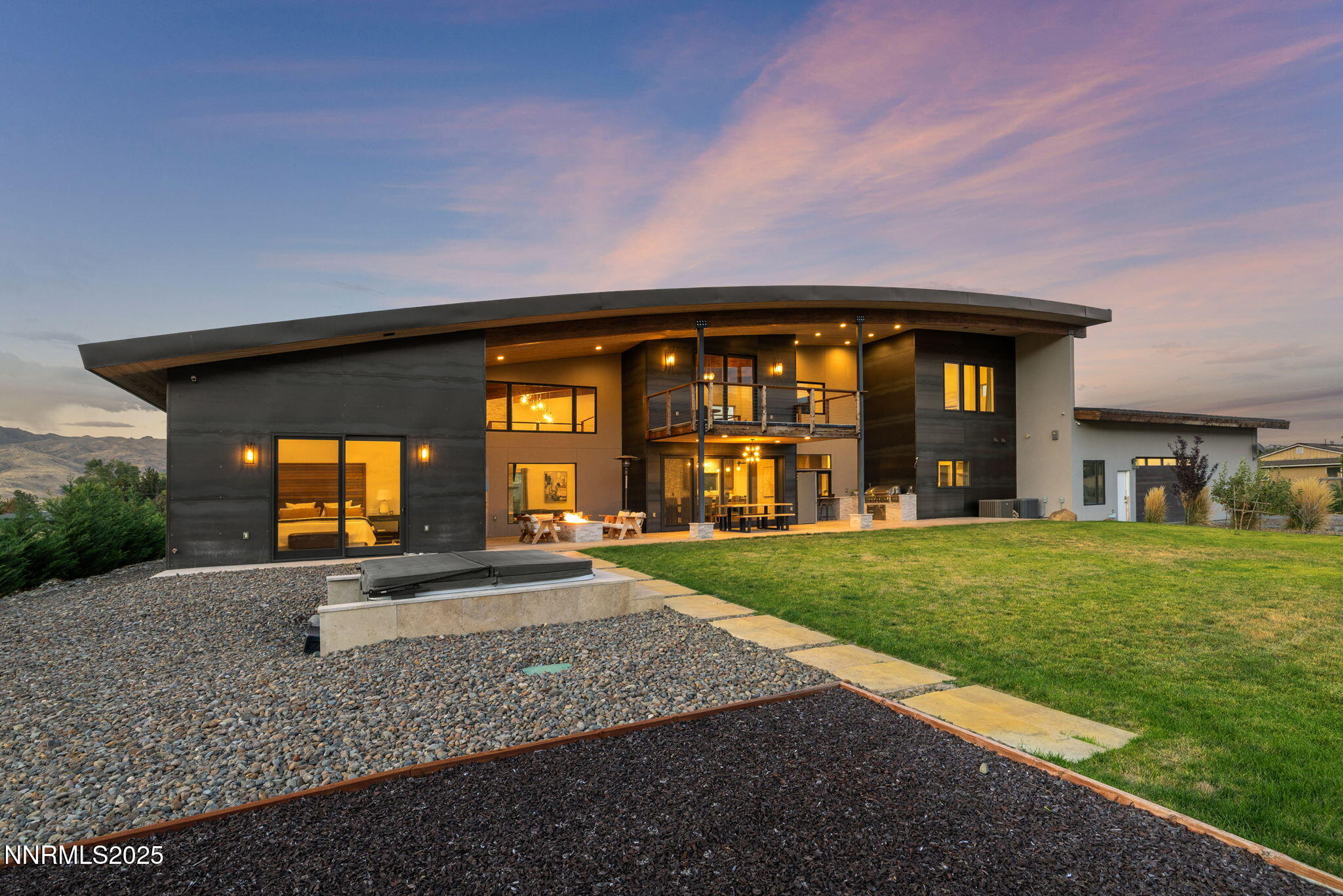 2255 Warrior Lane Reno, NV 89523 - Photo 46 of 52 a front view of a house with a yard and porch