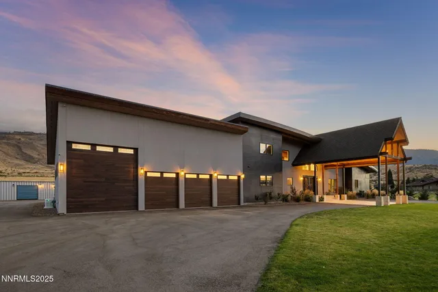 front view of a house with a garden