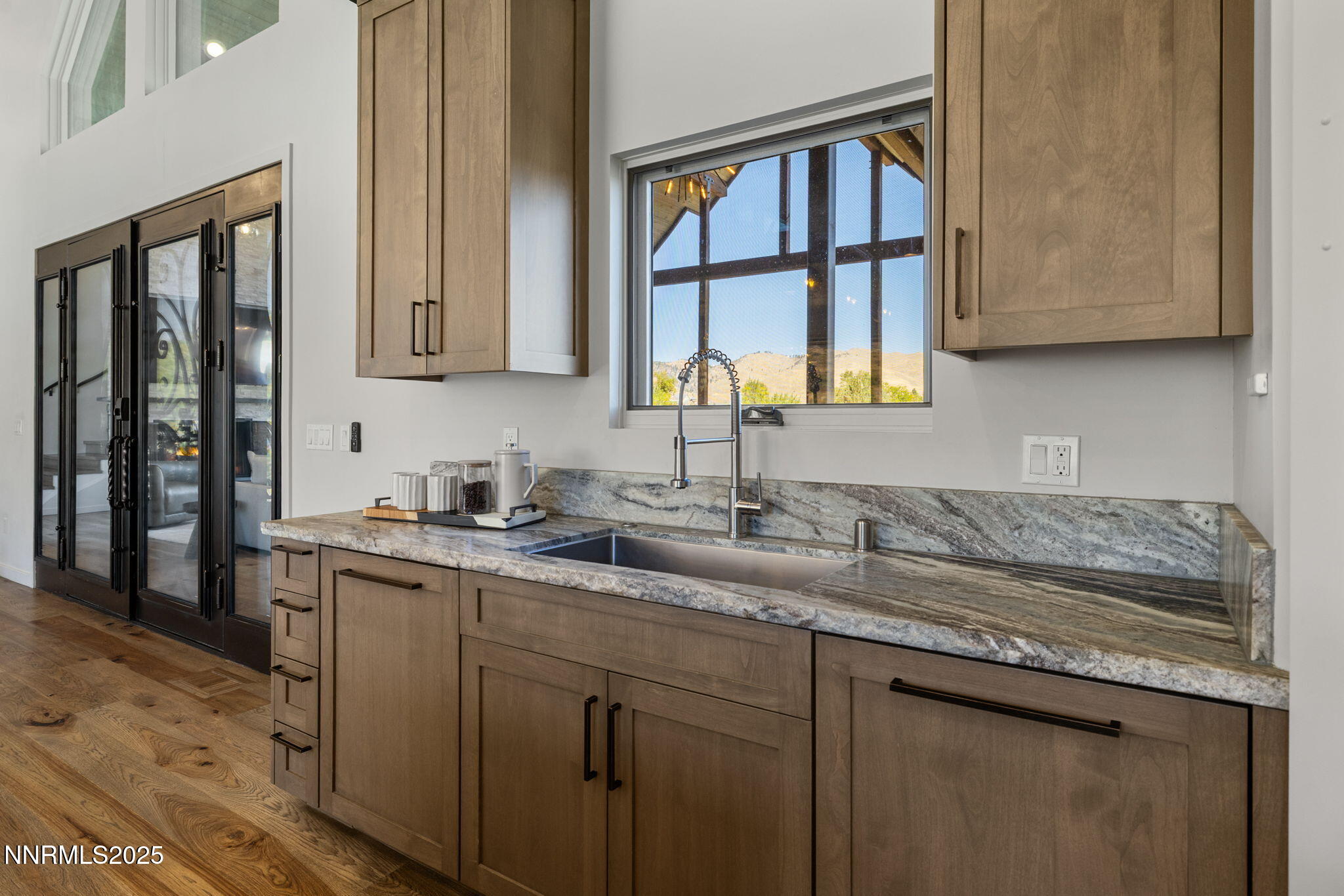 2255 Warrior Lane Reno, NV 89523 - Photo 7 of 52 a kitchen with stainless steel appliances granite countertop a sink a stove and cabinets