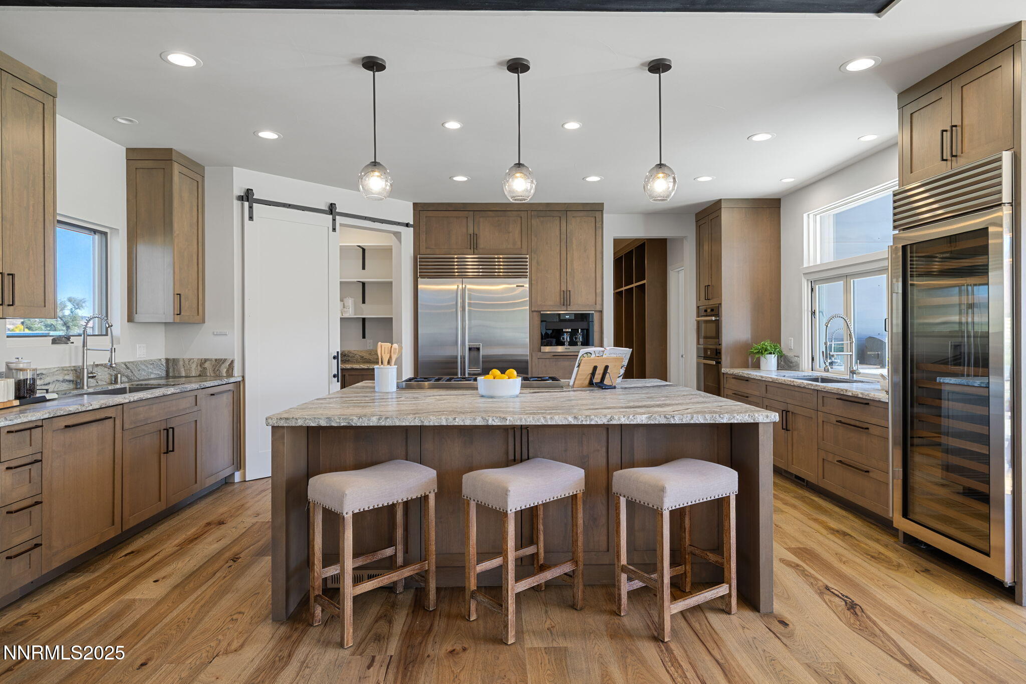 2255 Warrior Lane Reno, NV 89523 - Photo 8 of 52 a large kitchen with a table and chairs