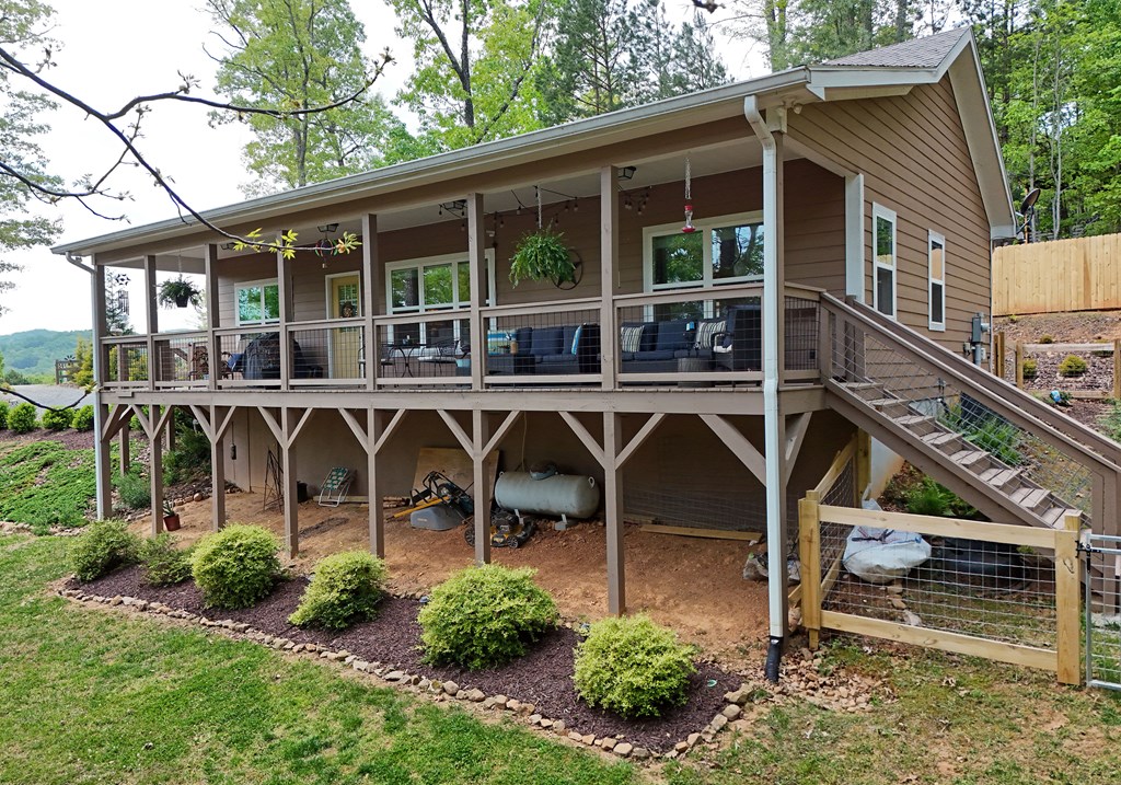 83 Highland Road Blairsville, GA 30512 - Photo 6 of 32 front view of a house with a small yard