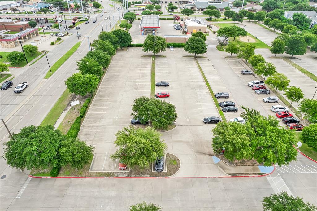 2660 Belt Line Road Garland, TX 75044 - Photo 5 of 23 an aerial view of a house with a yard and garden