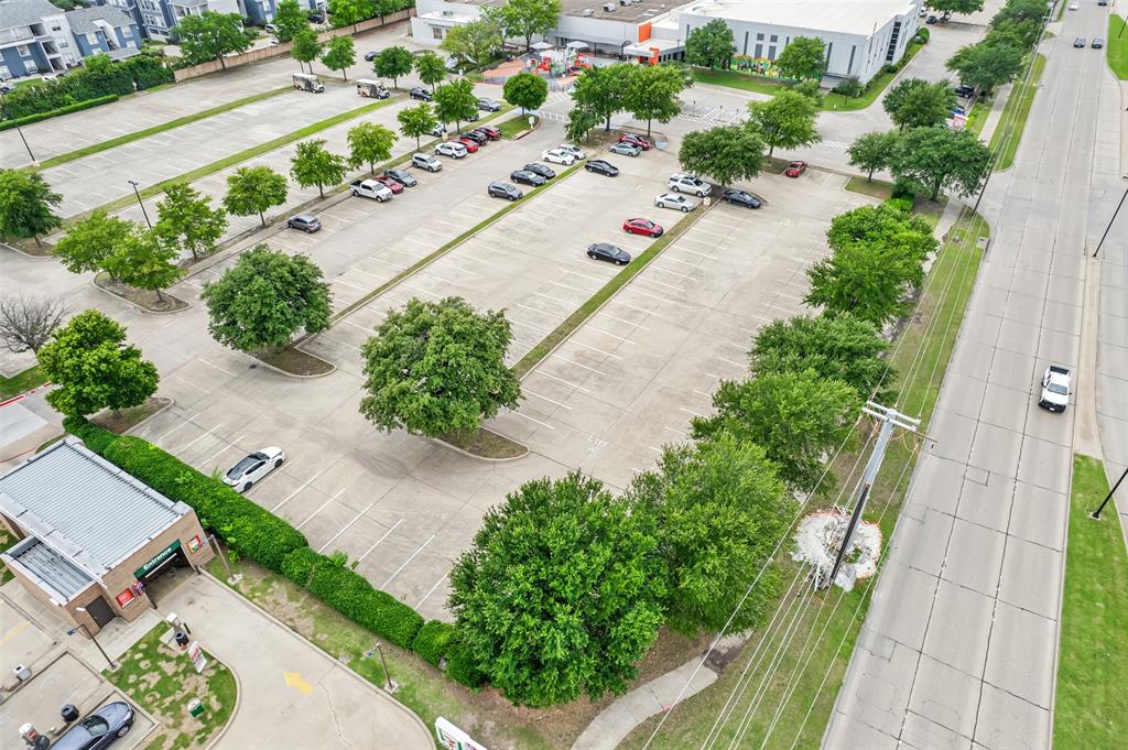 2660 Belt Line Road Garland, TX 75044 - Photo 8 of 23 an aerial view of a house with a yard and a garden