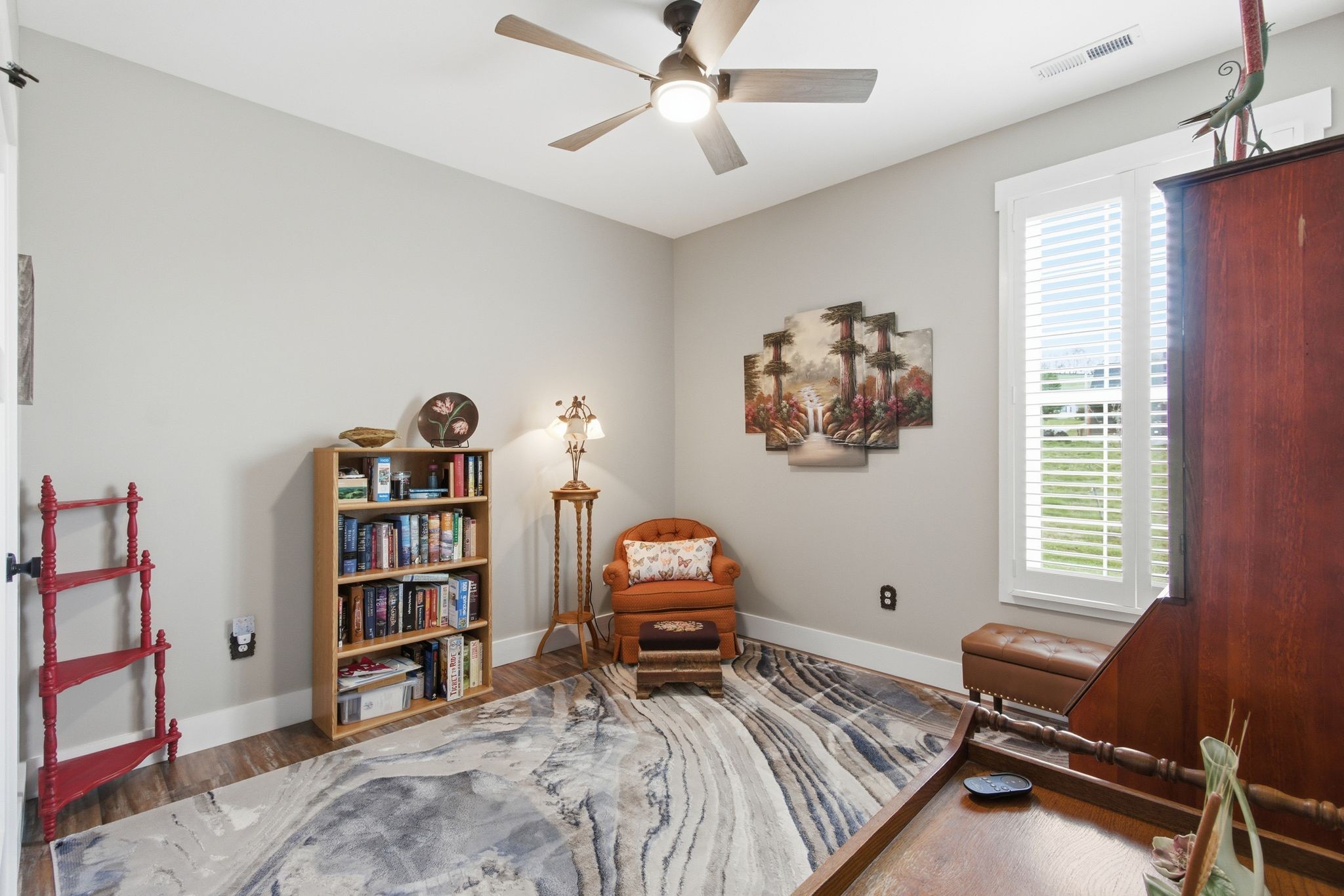 2705 Mc Connell Road Cornersville, TN 37047 - Photo 27 of 41 a bedroom with a bed and a book shelf
