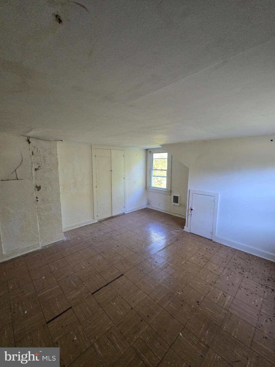 5258 Preston Road Federalsburg, MD 21632 - Photo 8 of 19 a view of empty room with windows