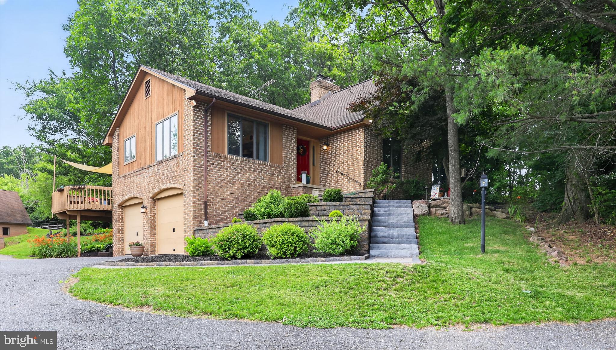2571 Valley View Road Morgantown, PA 19543 - Photo 12 of 75 Charming home nestled in lush greenery.