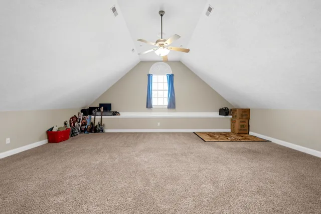 a view of a backyard with a swimming pool