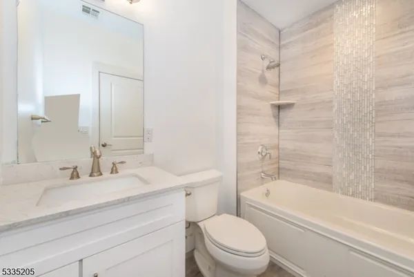 a close view of a bathtub in bathroom