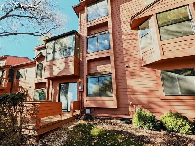 swimming pool view with a seating space