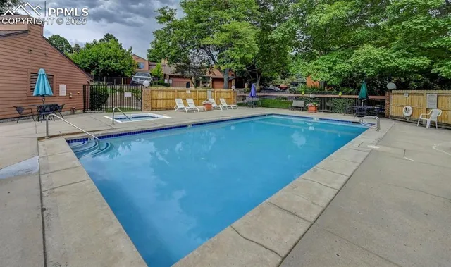 a view of a chairs and tables in the patio