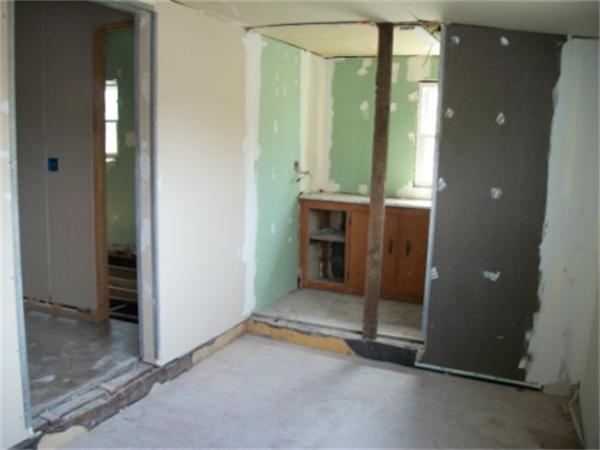 520 Granby Road Chicopee, MA 01013 - Photo 5 of 11 an empty room with fireplace and windows