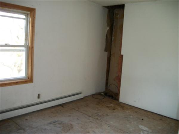 520 Granby Road Chicopee, MA 01013 - Photo 10 of 11 an empty room with a window