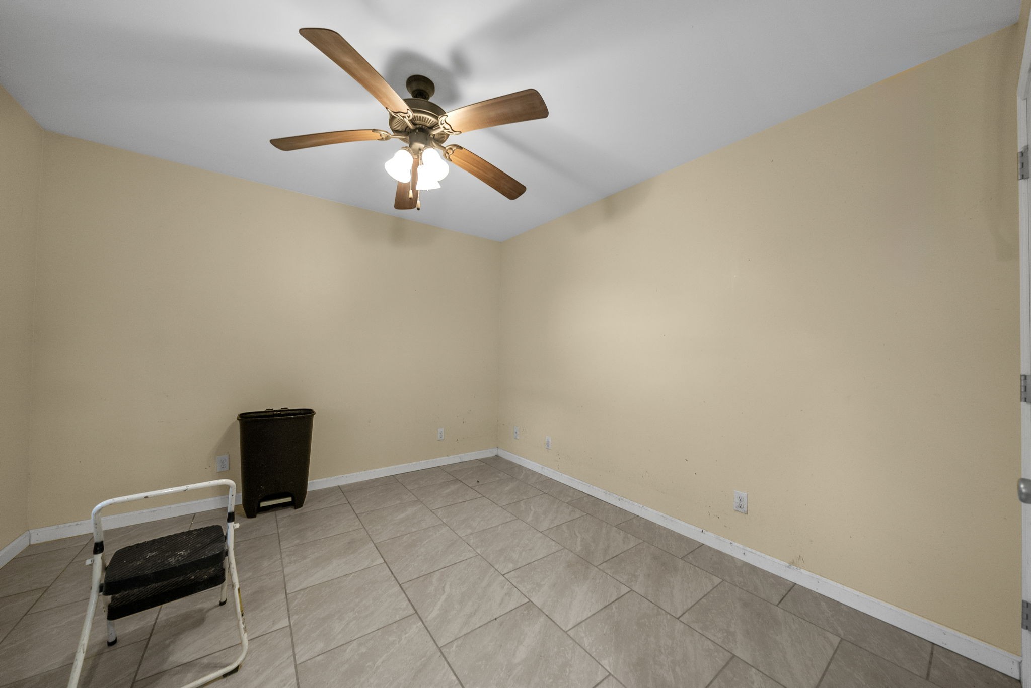 5619 Pembroke-Fairview Road Pembroke, KY 42266 - Photo 23 of 29 an empty room with wooden floor and windows
