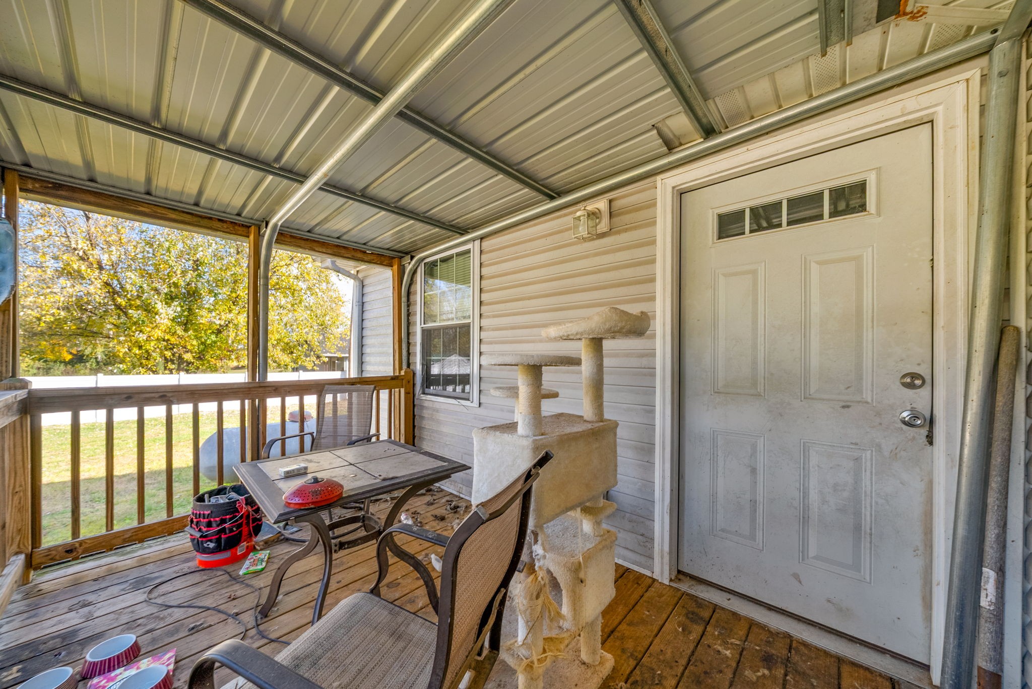 5619 Pembroke-Fairview Road Pembroke, KY 42266 - Photo 26 of 29 a balcony with wooden floor and furniture