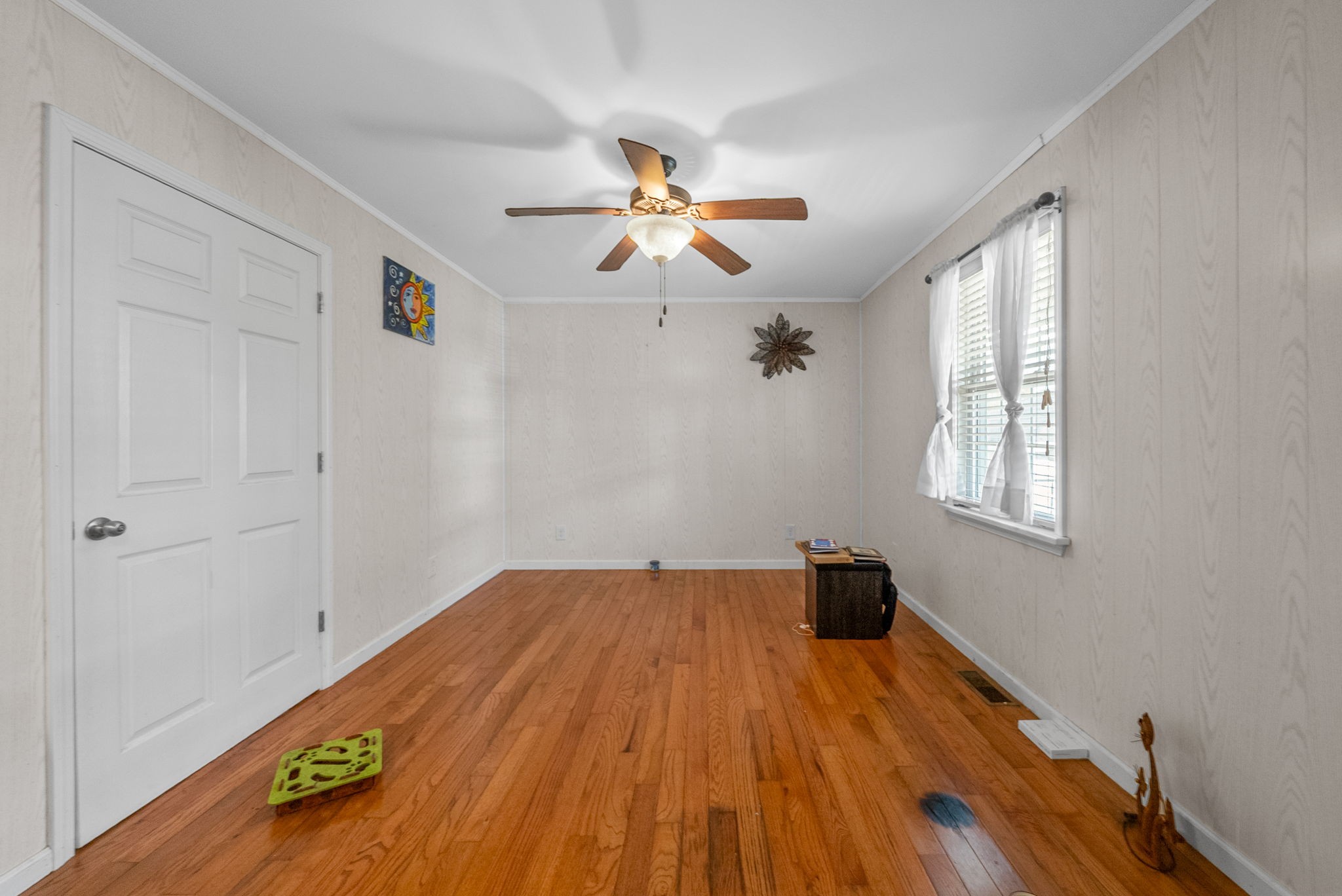 5619 Pembroke-Fairview Road Pembroke, KY 42266 - Photo 6 of 29 a bedroom with a bed and a chandelier fan