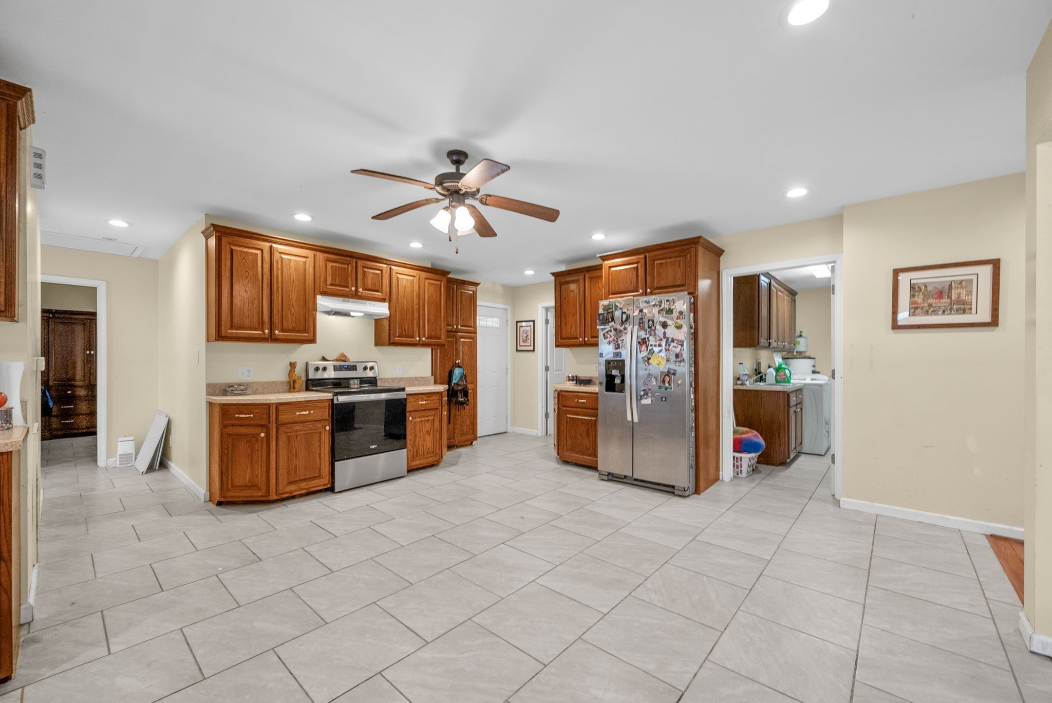 5619 Pembroke-Fairview Road Pembroke, KY 42266 - Photo 10 of 29 a kitchen with stainless steel appliances kitchen island granite countertop a refrigerator and a sink