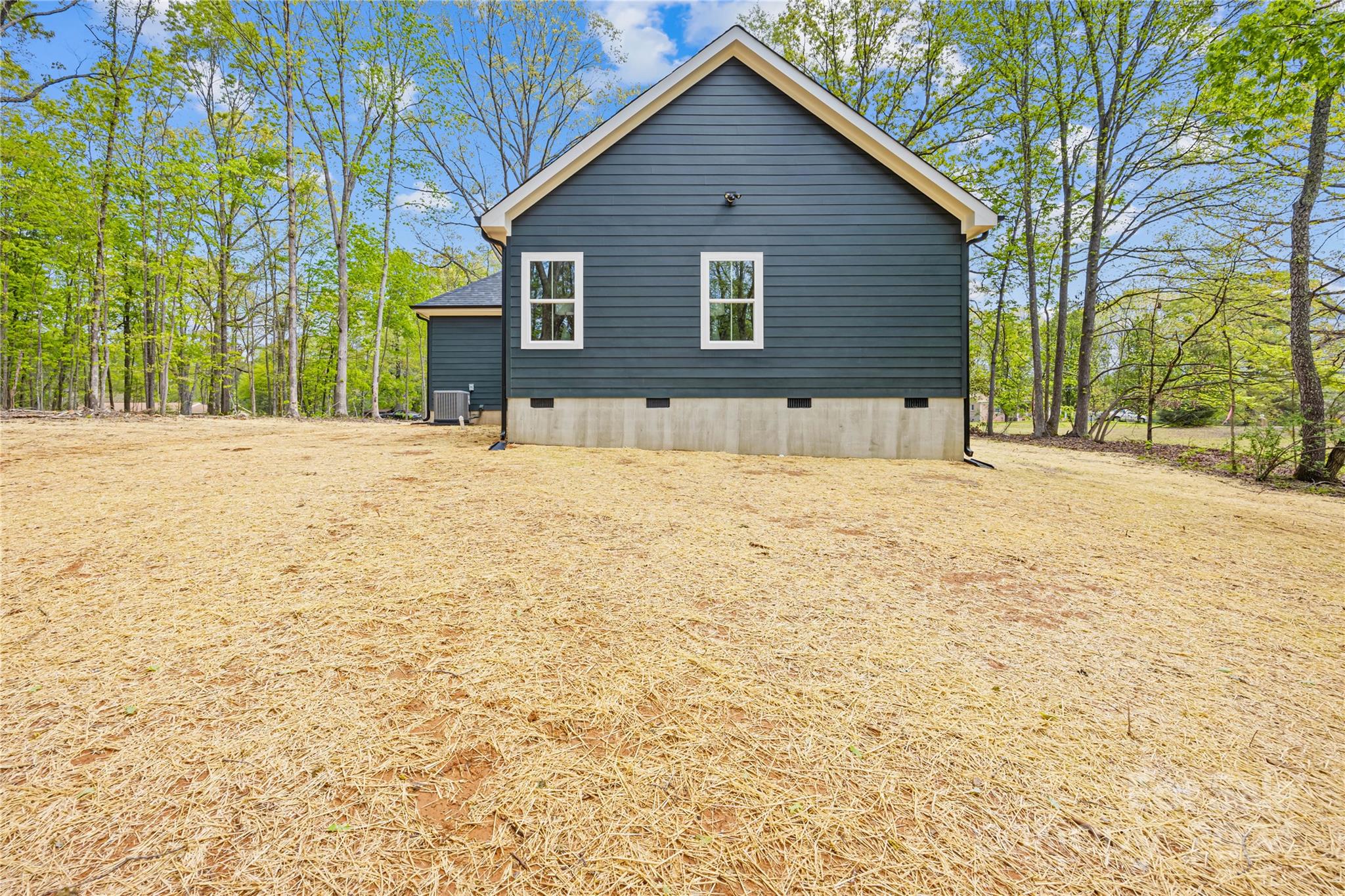 1237 Oak Hill Road Chester, SC 29706 - Photo 26 of 27 a front view of a house with a yard and garage