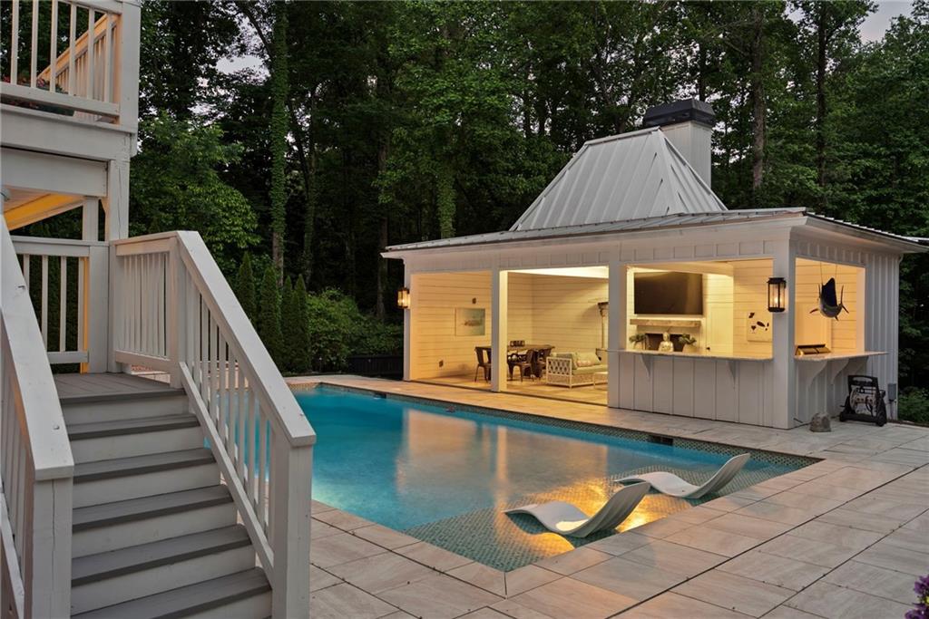 13460 New Providence Road Milton, GA 30004 - Photo 56 of 60 a view of a house with backyard and deck