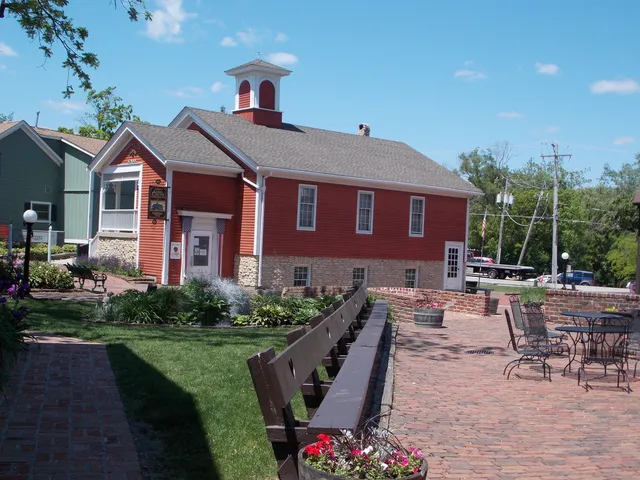 a front view of a house with outdoor seating yard