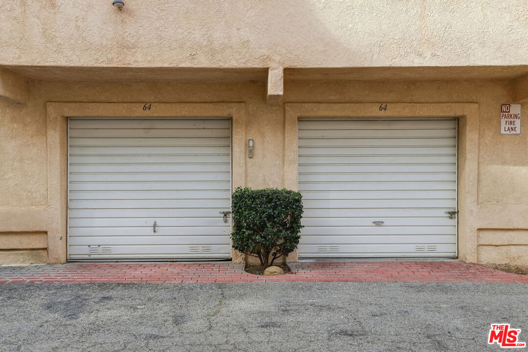 19834 Sandpiper Place, Unit 64 Newhall, CA 91321 - Photo 34 of 40 a view of a entryway door front of house
