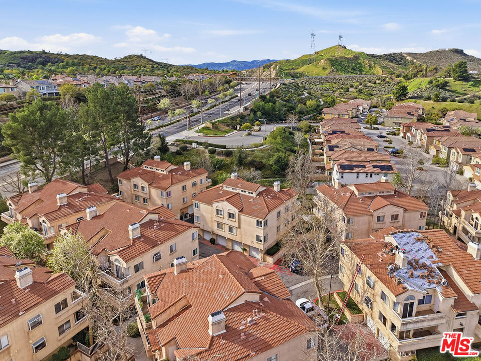 19834 Sandpiper Place, Unit 64 Newhall, CA 91321 - Photo 39 of 40 an aerial view of residential houses with outdoor space