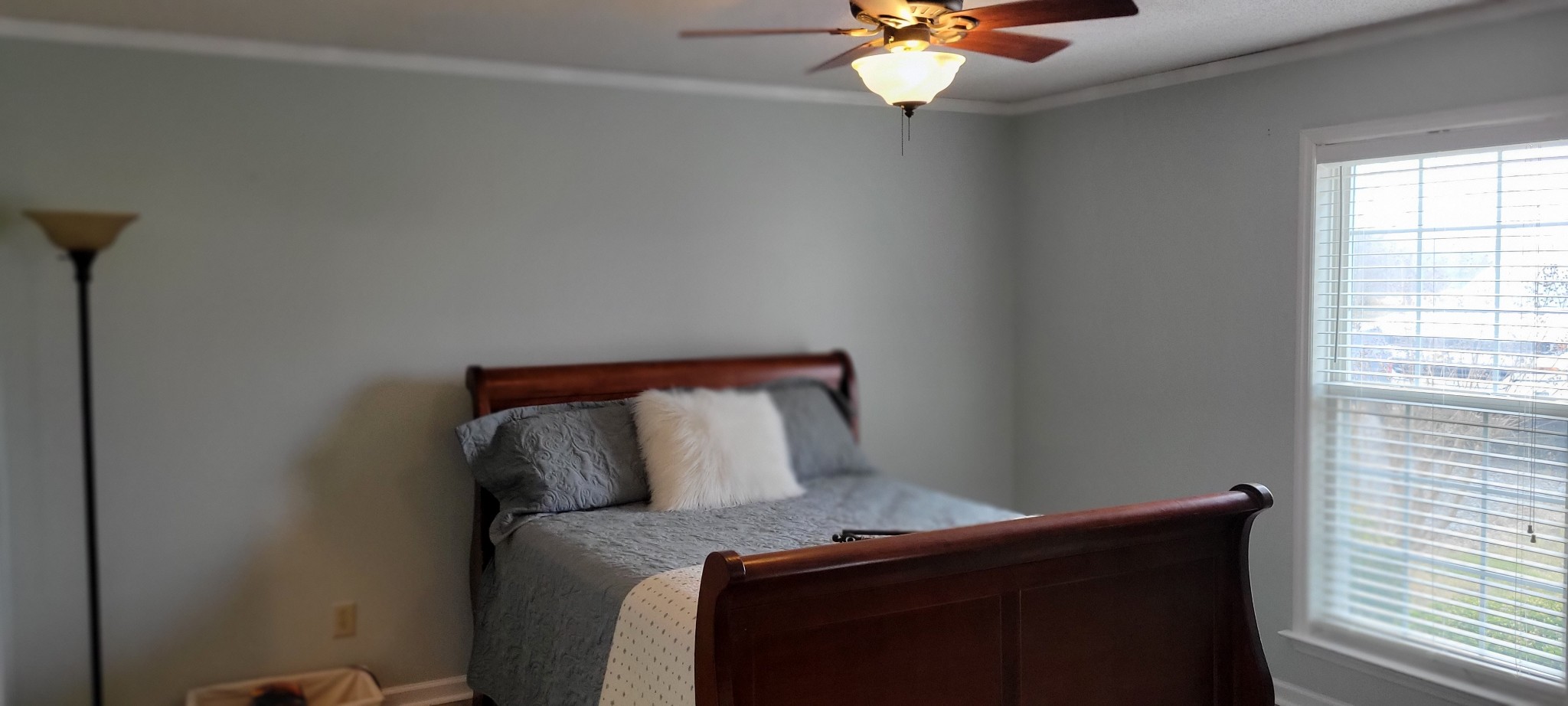 1534 Marable Road Lawrenceburg, TN 38464 - Photo 8 of 13 a bedroom with a bed and window
