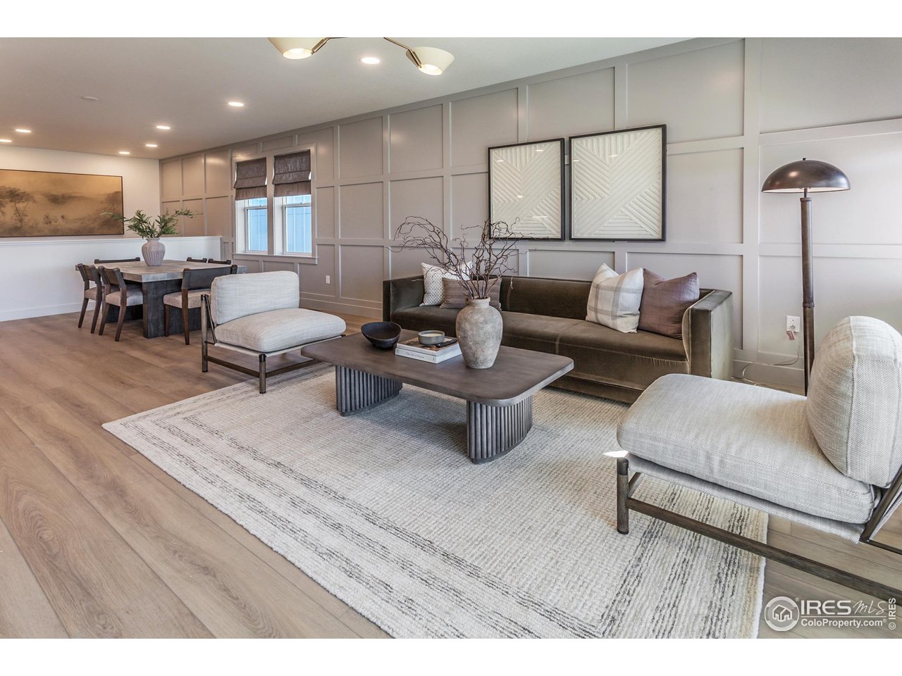 792 Chatter Road Windsor, CO 80550 - Photo 13 of 42 a living room with furniture and a table