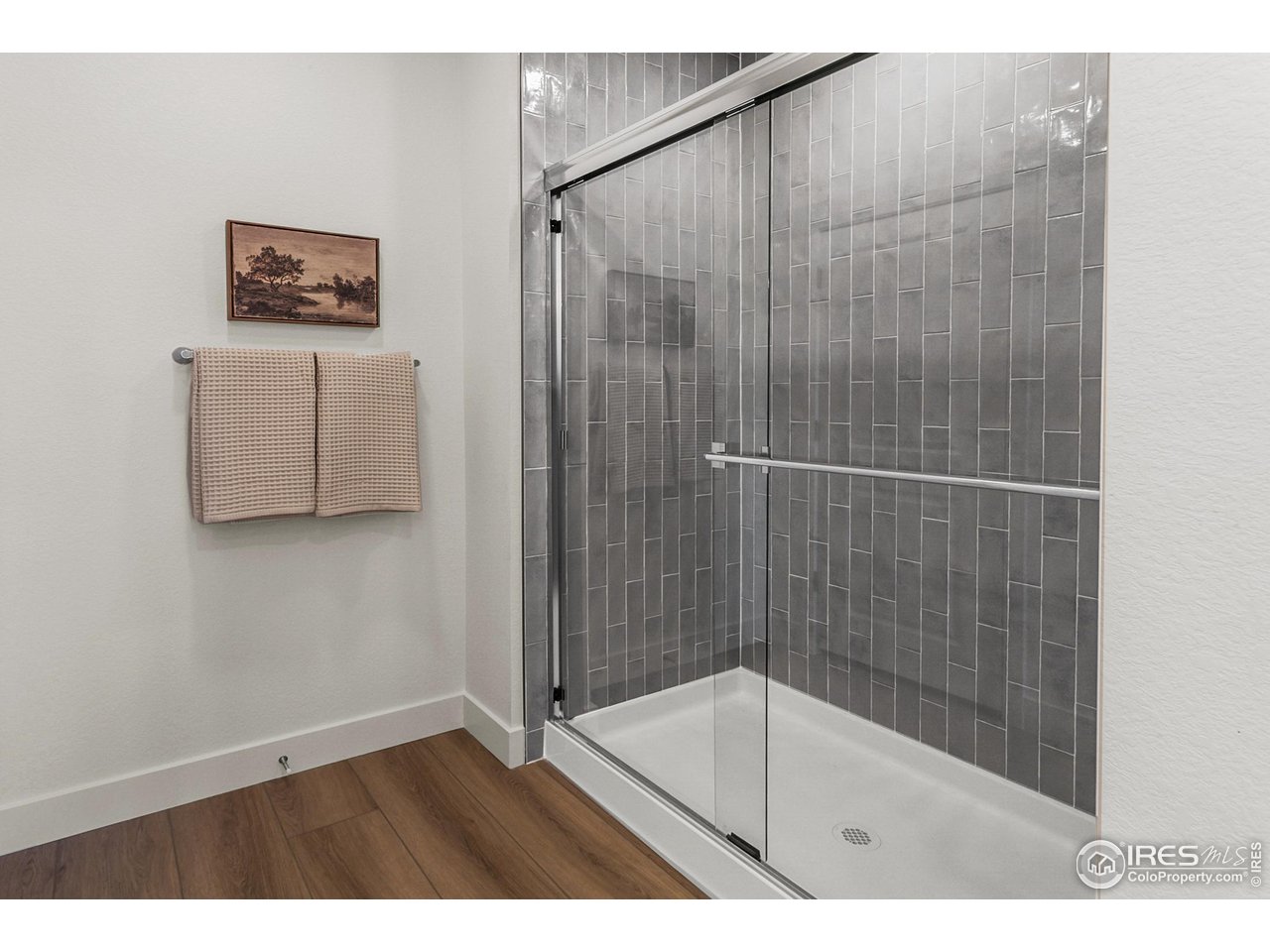 792 Chatter Road Windsor, CO 80550 - Photo 29 of 42 a bathroom with a shower and a sink