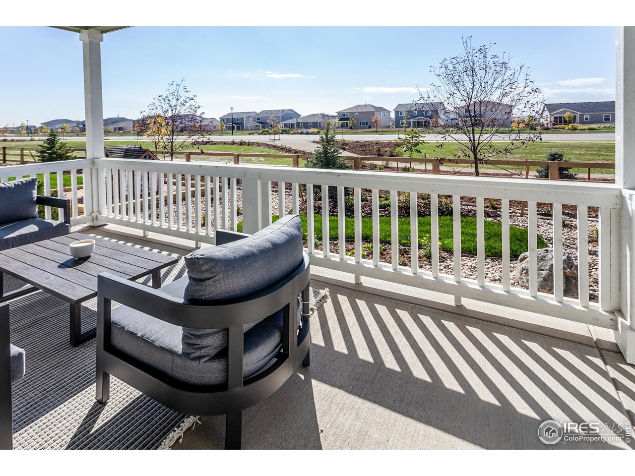 792 Chatter Road Windsor, CO 80550 - Photo 41 of 42 a view of a balcony with furniture