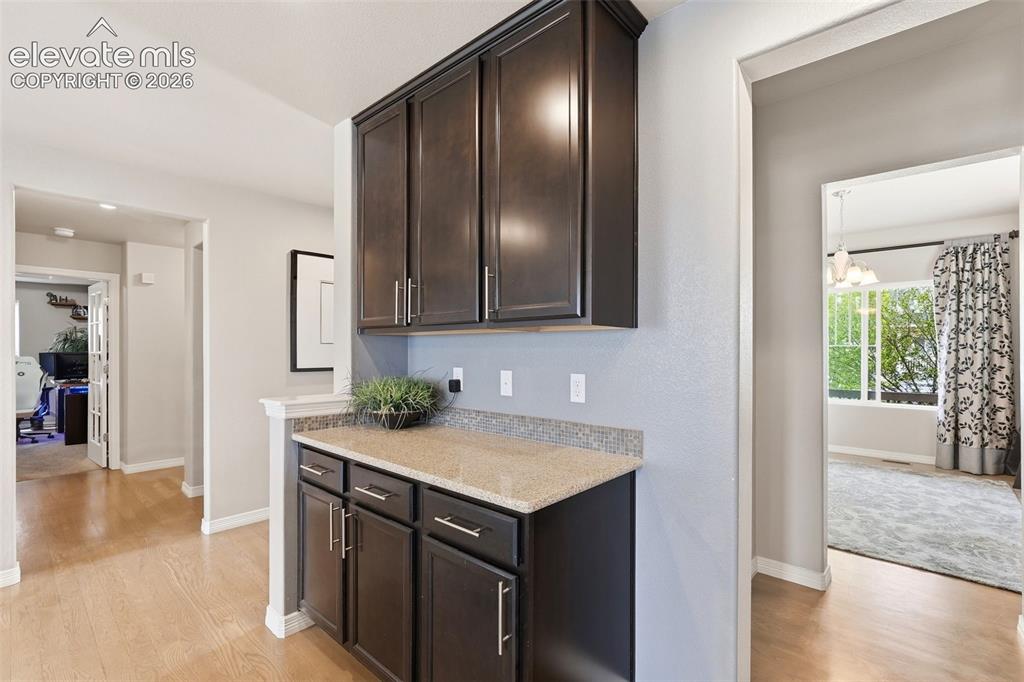 2264 Reed Grass Way Colorado Springs, CO 80915 - Photo 16 of 50 a view of a kitchen from the hallway
