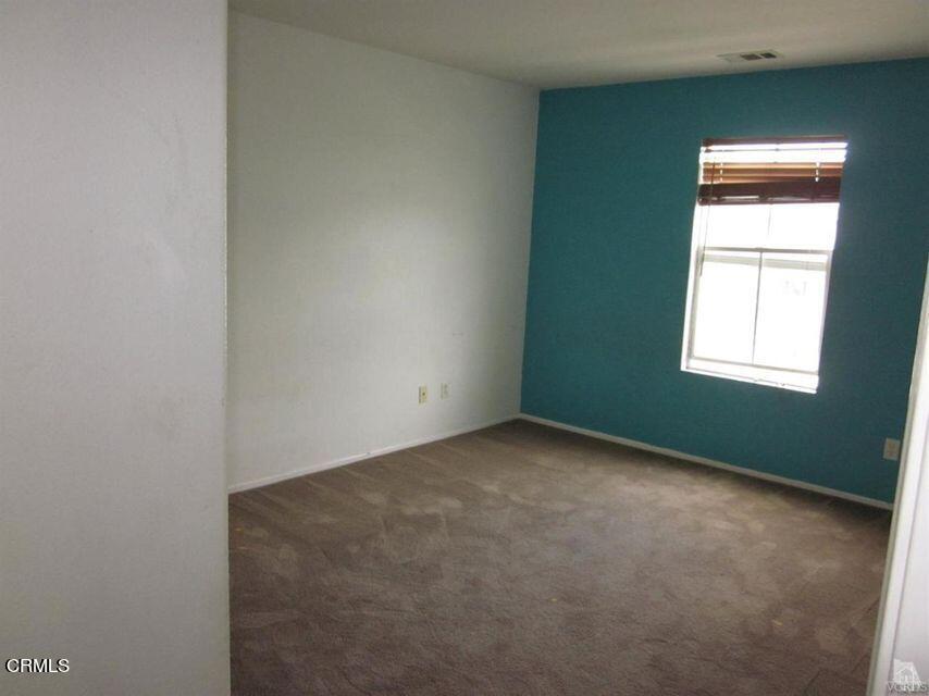 1731 Sonata Drive Oxnard, CA 93030 - Photo 11 of 13 an empty room with a window