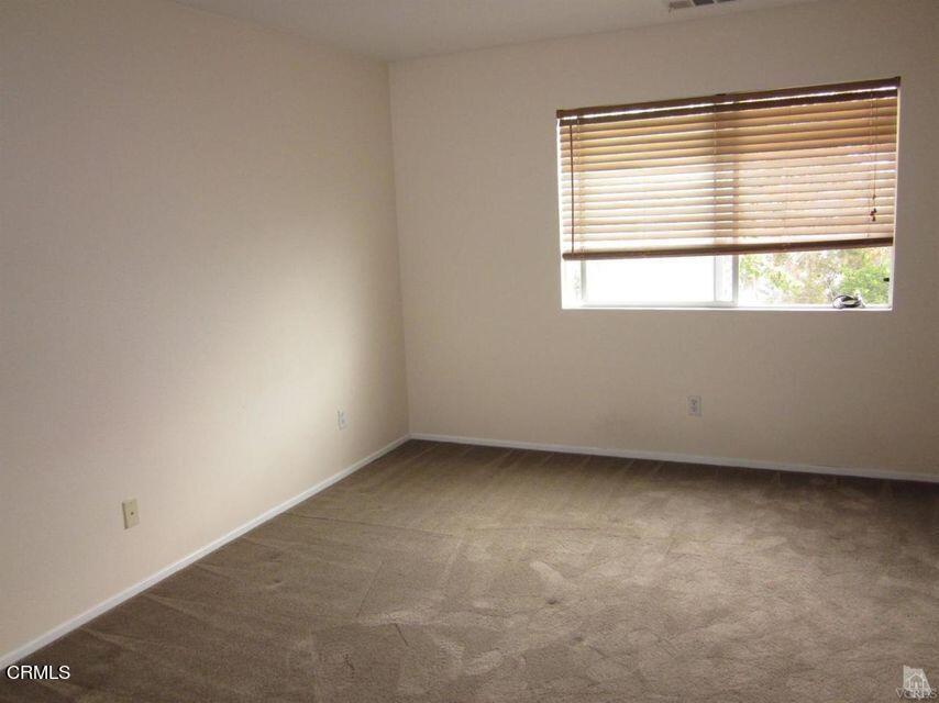 1731 Sonata Drive Oxnard, CA 93030 - Photo 9 of 13 an empty room with a window