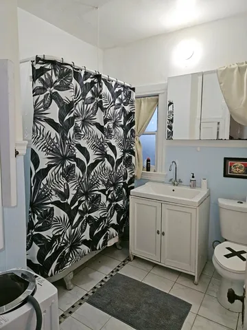 a view of entryway with stairs and wooden floor