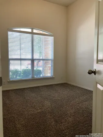 a bathroom with a toilet a sink and bathtub