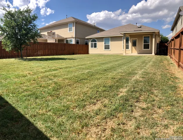 a front view of house with yard