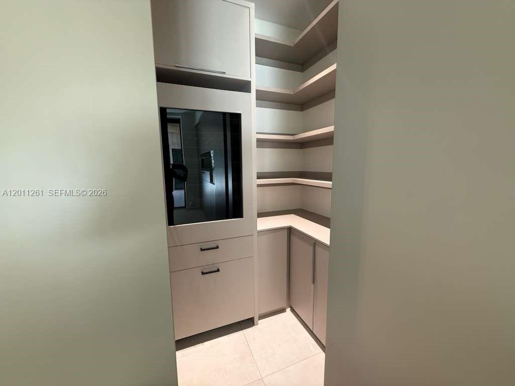 135 Southwest 29th Road Miami, FL 33129 - Photo 14 of 47 a view of walk in closet