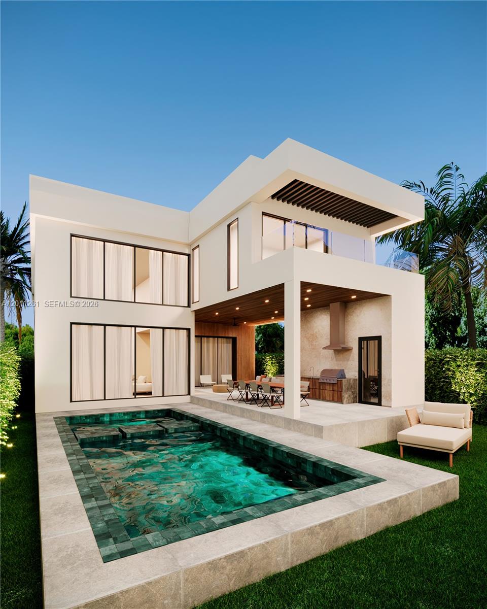 135 Southwest 29th Road Miami, FL 33129 - Photo 2 of 47 a front view of a house with garden