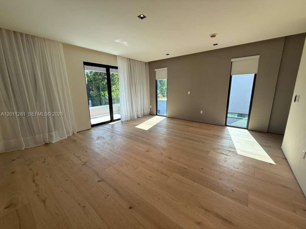 135 Southwest 29th Road Miami, FL 33129 - Photo 28 of 47 a view of a livingroom with wooden floor and window