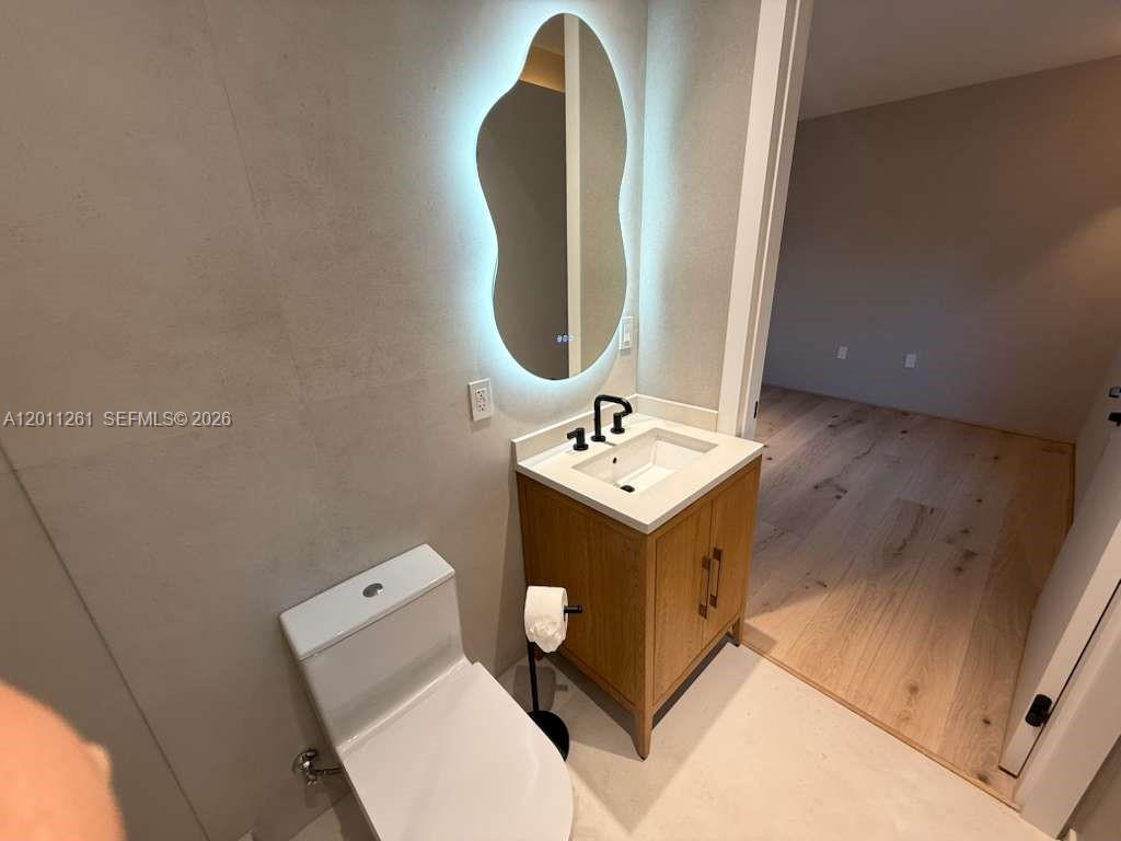 135 Southwest 29th Road Miami, FL 33129 - Photo 43 of 47 a bathroom with a sink and mirror