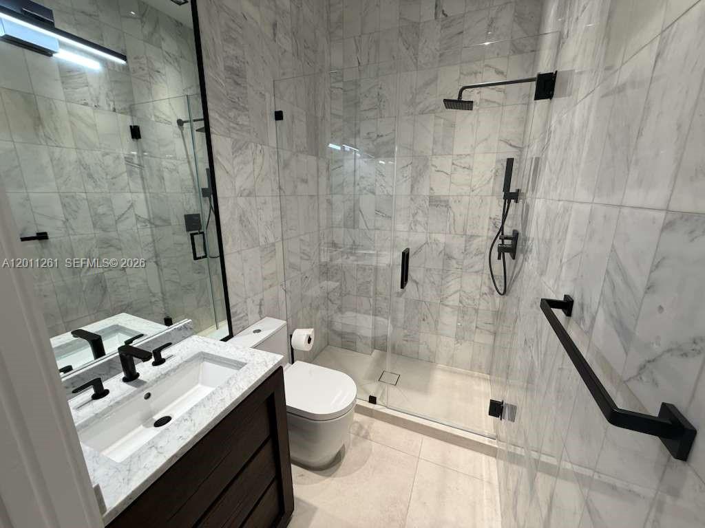 135 Southwest 29th Road Miami, FL 33129 - Photo 46 of 47 a bathroom with a sink toilet and shower