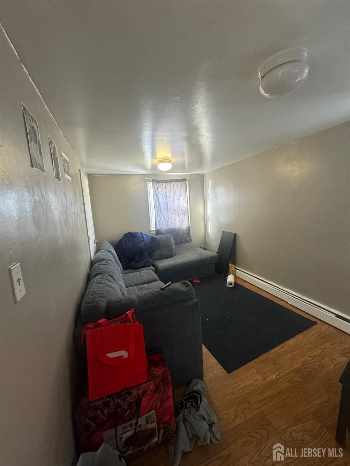 9 Hermann Street Carteret, NJ 07008 - Photo 11 of 23 a living room with furniture