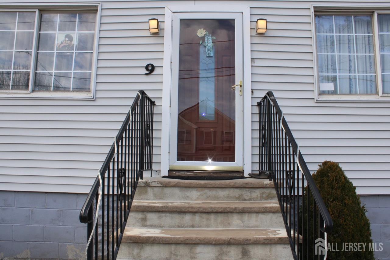 9 Hermann Street Carteret, NJ 07008 - Photo 4 of 23 a view of the entrance of the house
