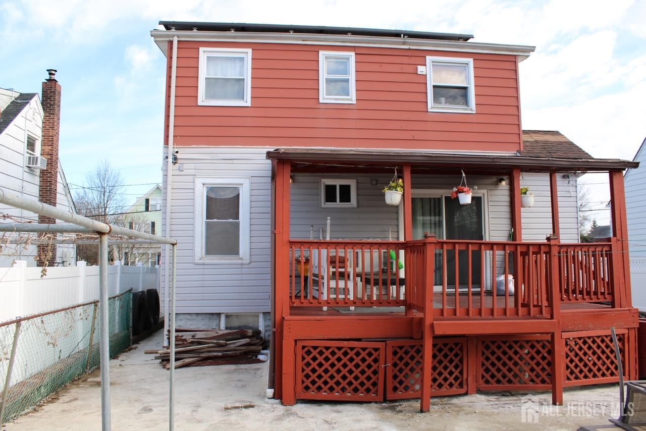 9 Hermann Street Carteret, NJ 07008 - Photo 5 of 23 a front view of a house with glass windows