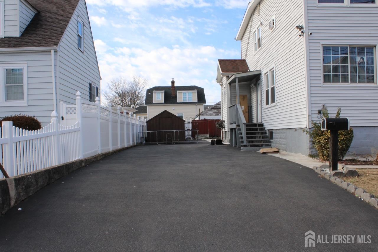 9 Hermann Street Carteret, NJ 07008 - Photo 7 of 23 a view of a house with a street