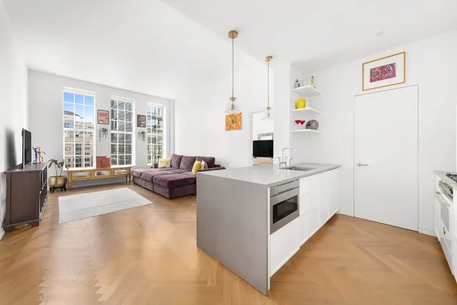 a picture of a bench in front of a window