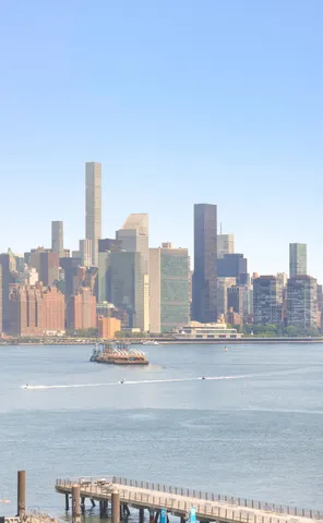 a kitchen with a refrigerator and a stove