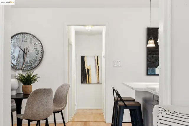 a view of a room with a furniture and a mirror